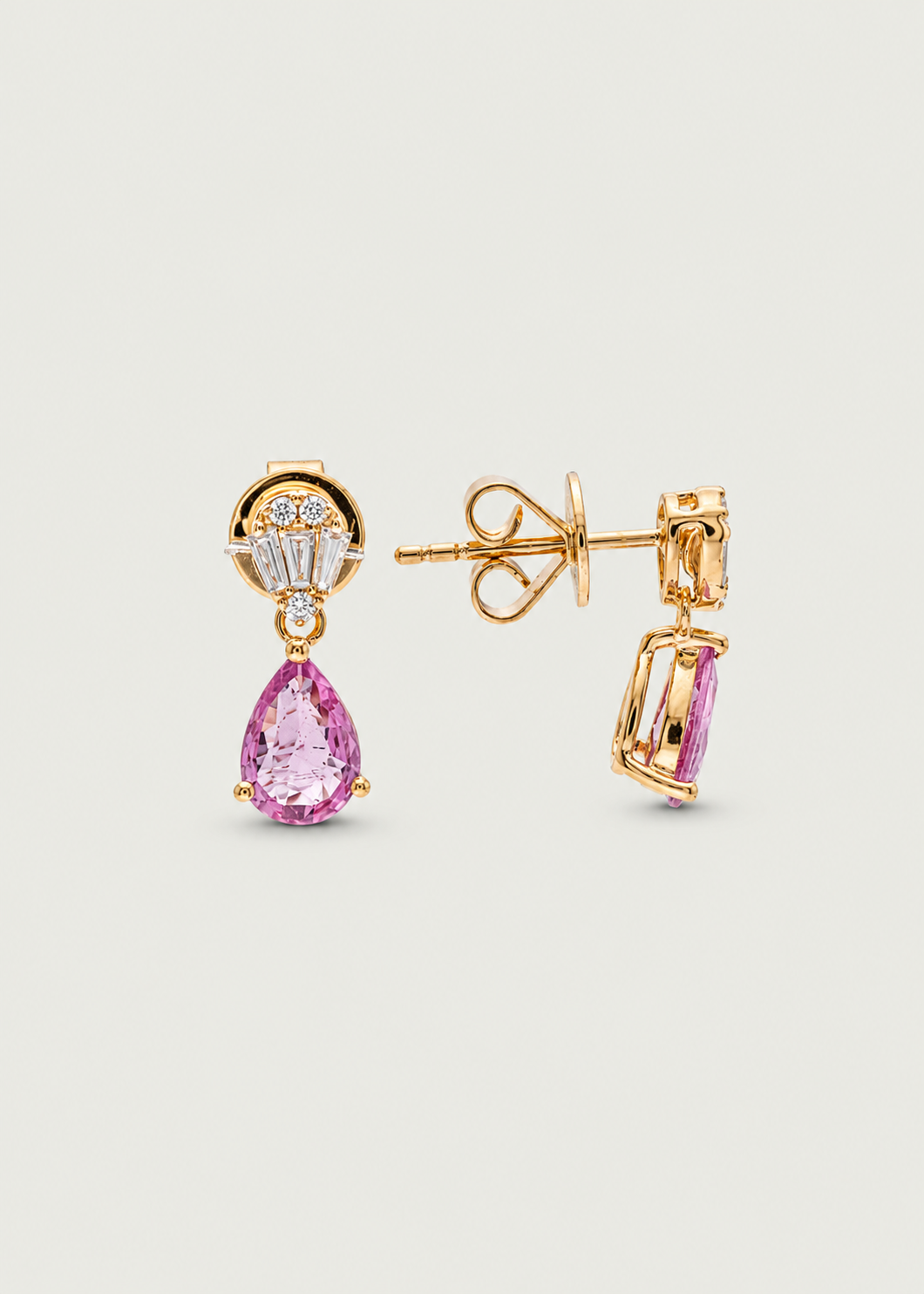 Elegant gold hoop earrings and diamond-studded earrings from the Koru Jewelers Puerto Rican earrings collection.